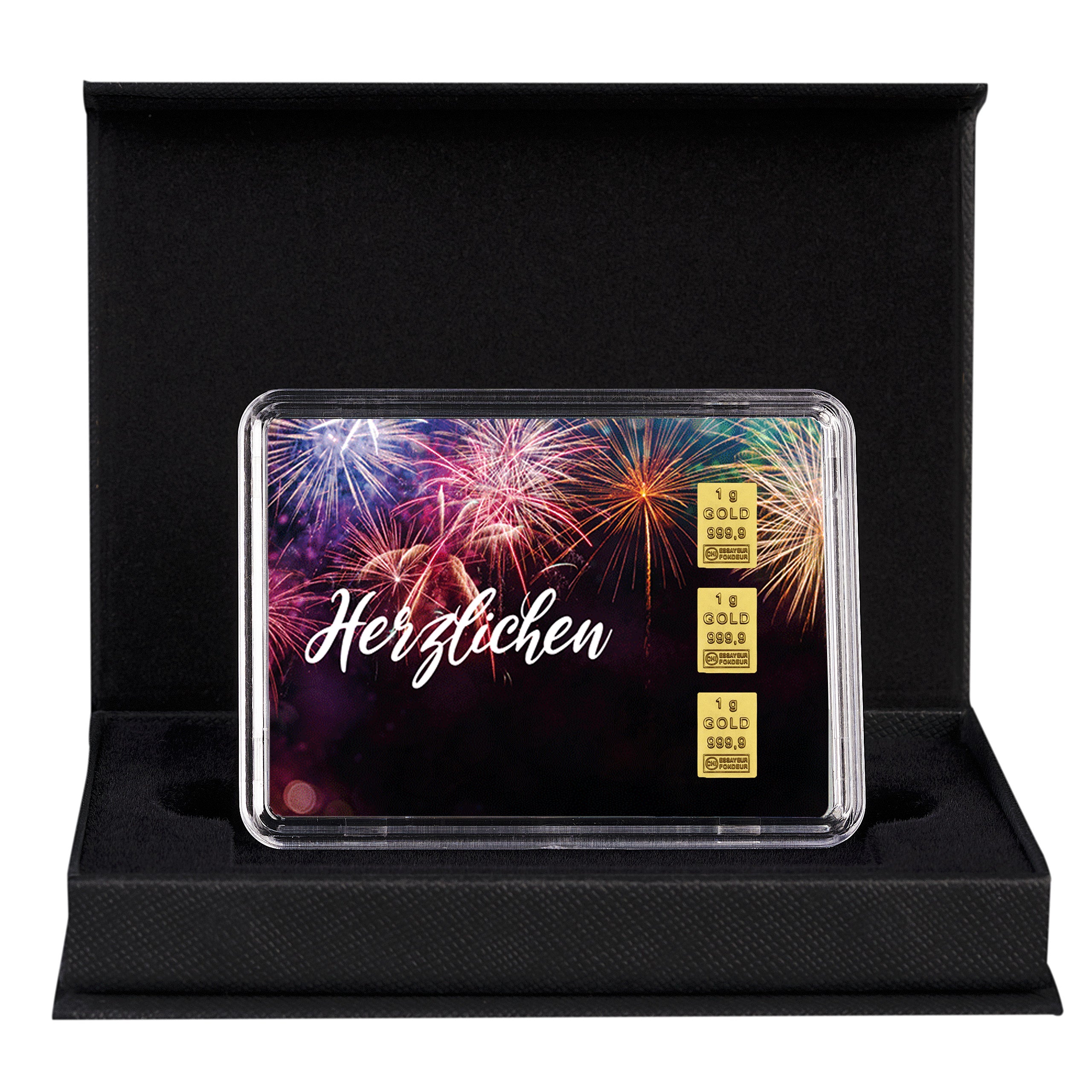 Geschenkbox mit 3x1g Goldbarren – Motiv „Herzlichen Glückwunsch“ vor farbenfrohem Feuerwerk